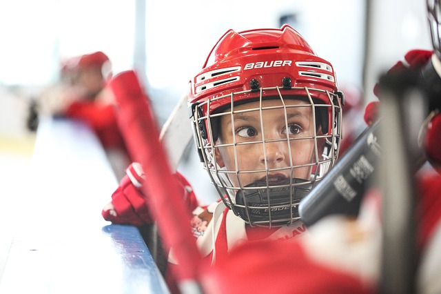 kid in hockey gear